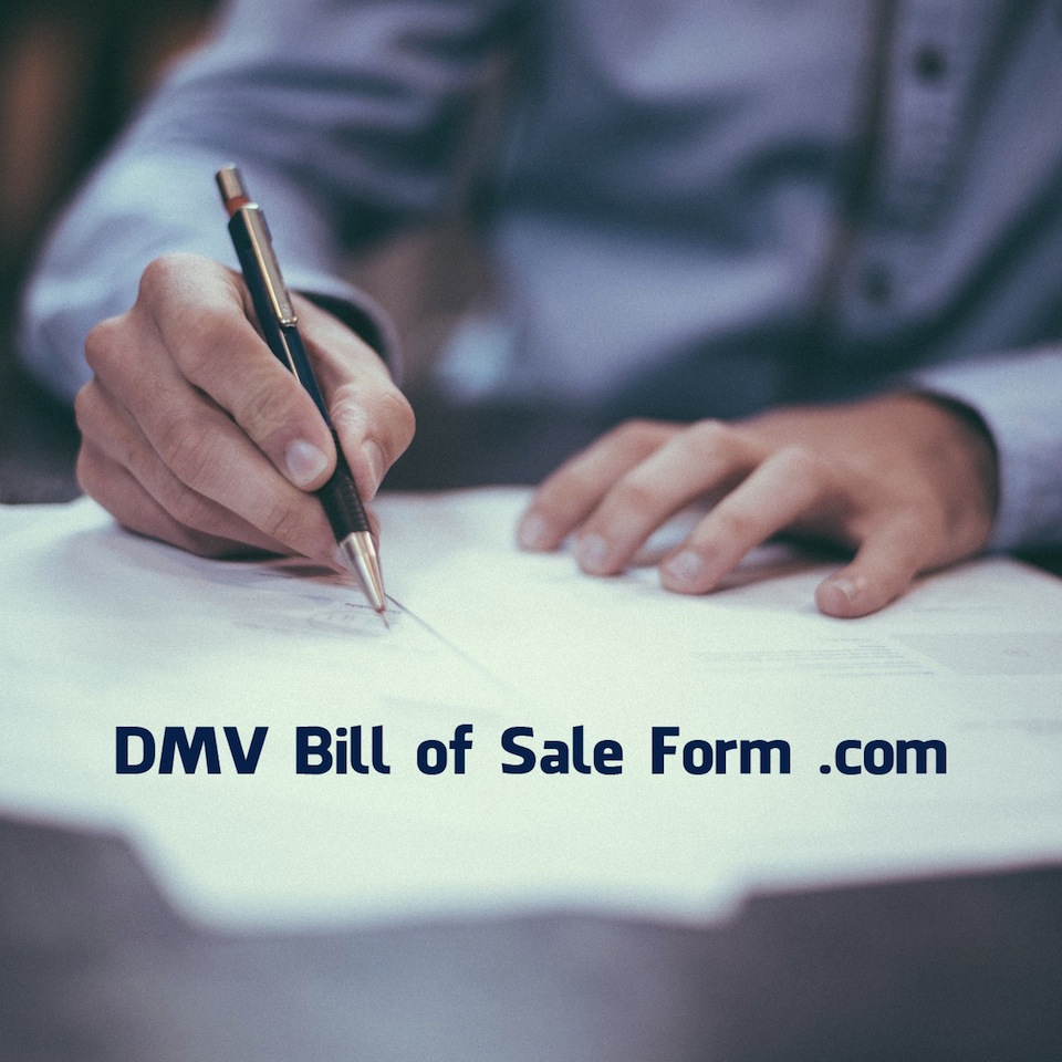 Photo of a person signing a DMV form